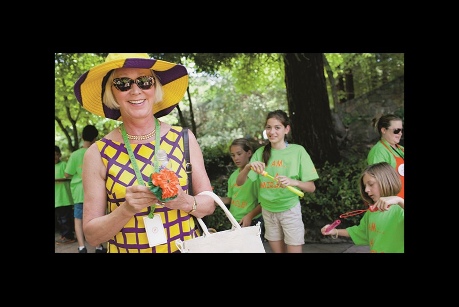 A COLORFUL CAST OF CHARACTERS AT AUCTION NAPA VALLEY, INCLUDING VIP BIDDERS, VINTNERS, VOLUNTEERS AND MEMBERS OF THE LOCAL BOYS & GIRLS CLUB, WHO GREET GUESTS WITH BUBBLES AND PAPER FLOWERS